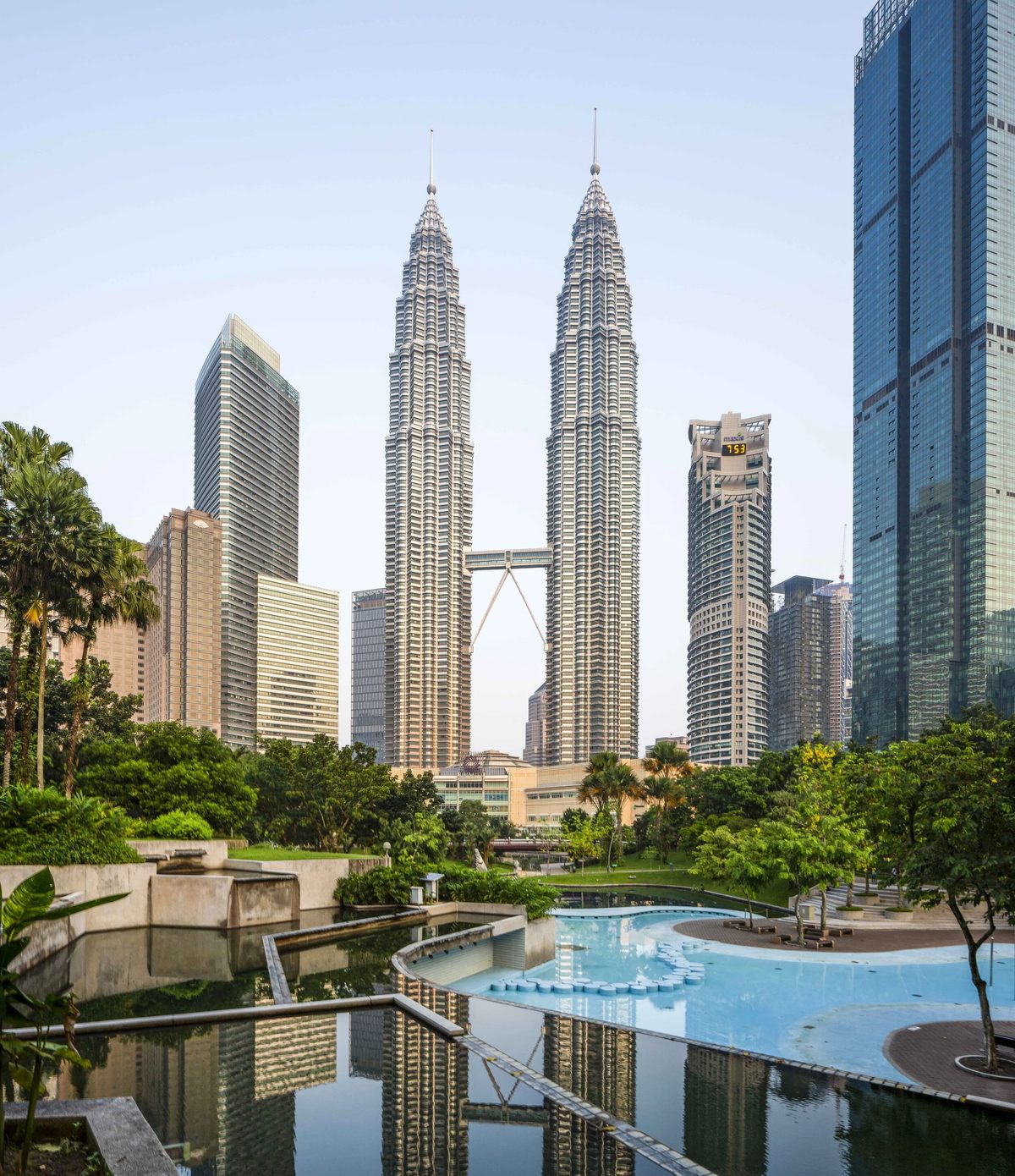 The Petronas Twin Towers towering above the Kuala Lumpur cityscape
