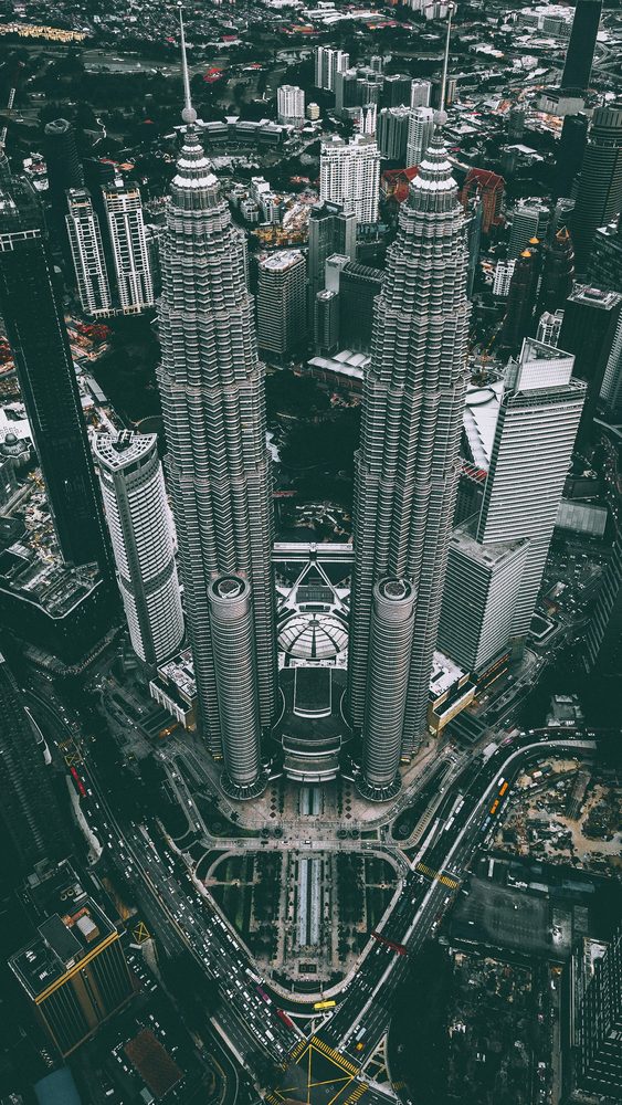 Petronas Twin Towers rising above the Kuala Lumpur skyline