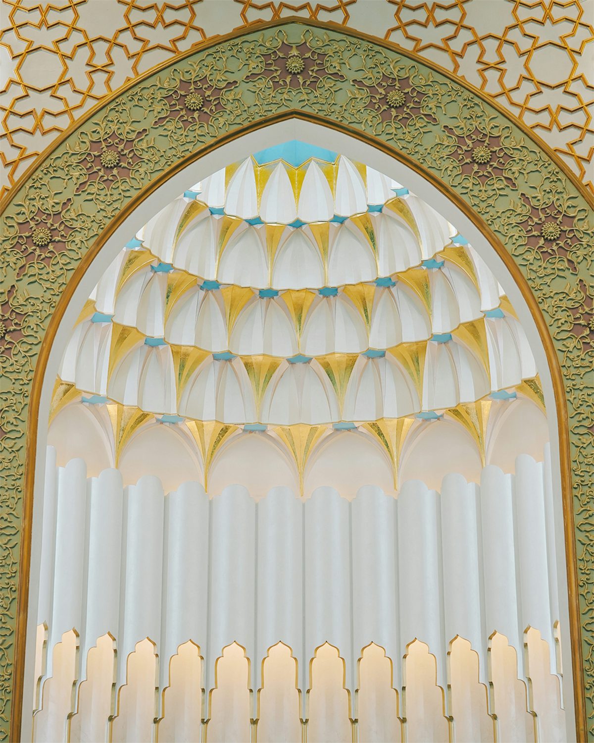Intricate Islamic geometric patterns on an architectural surface