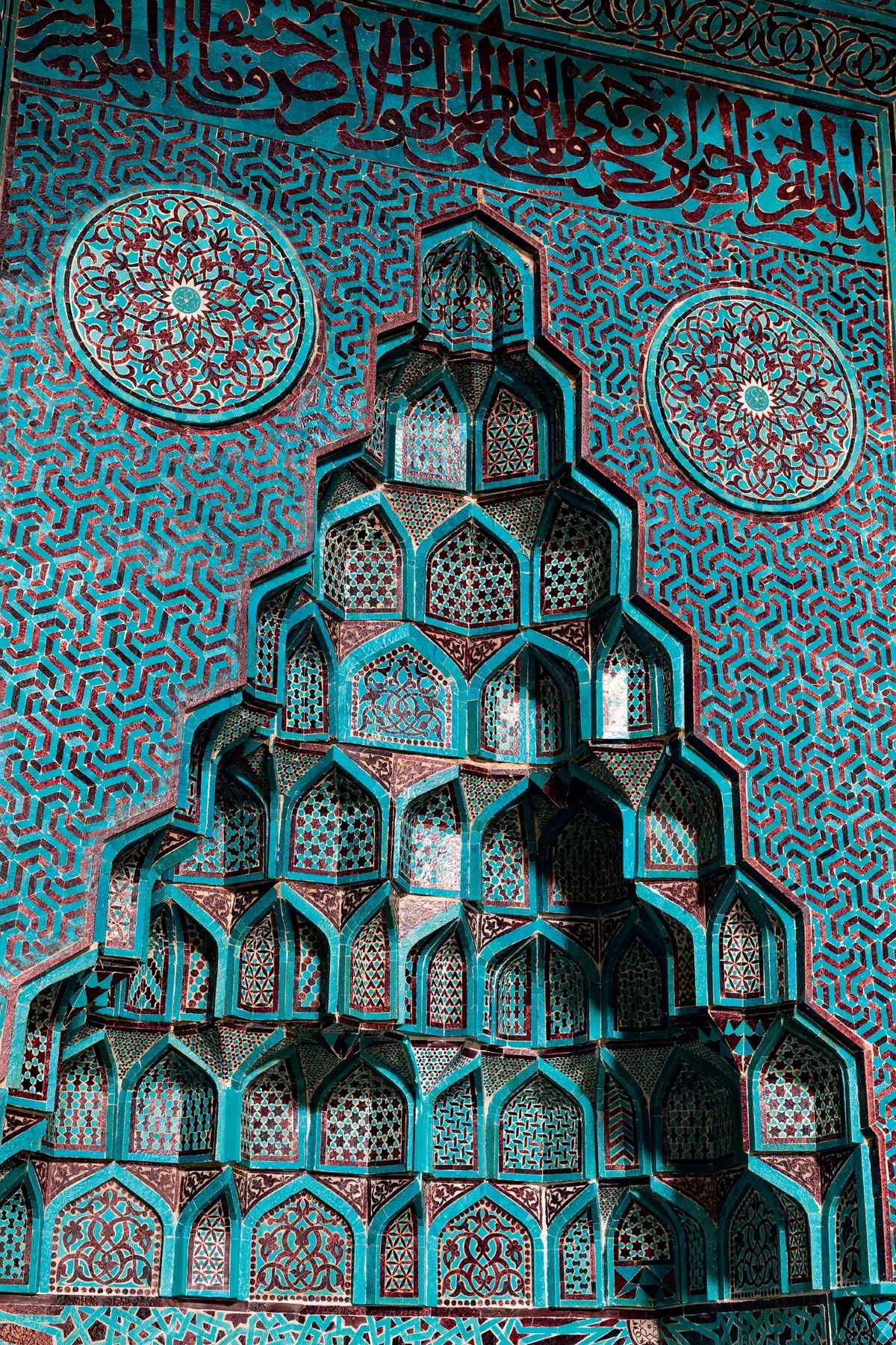 Detailed Islamic mosaic patterns showing interlocking geometric forms