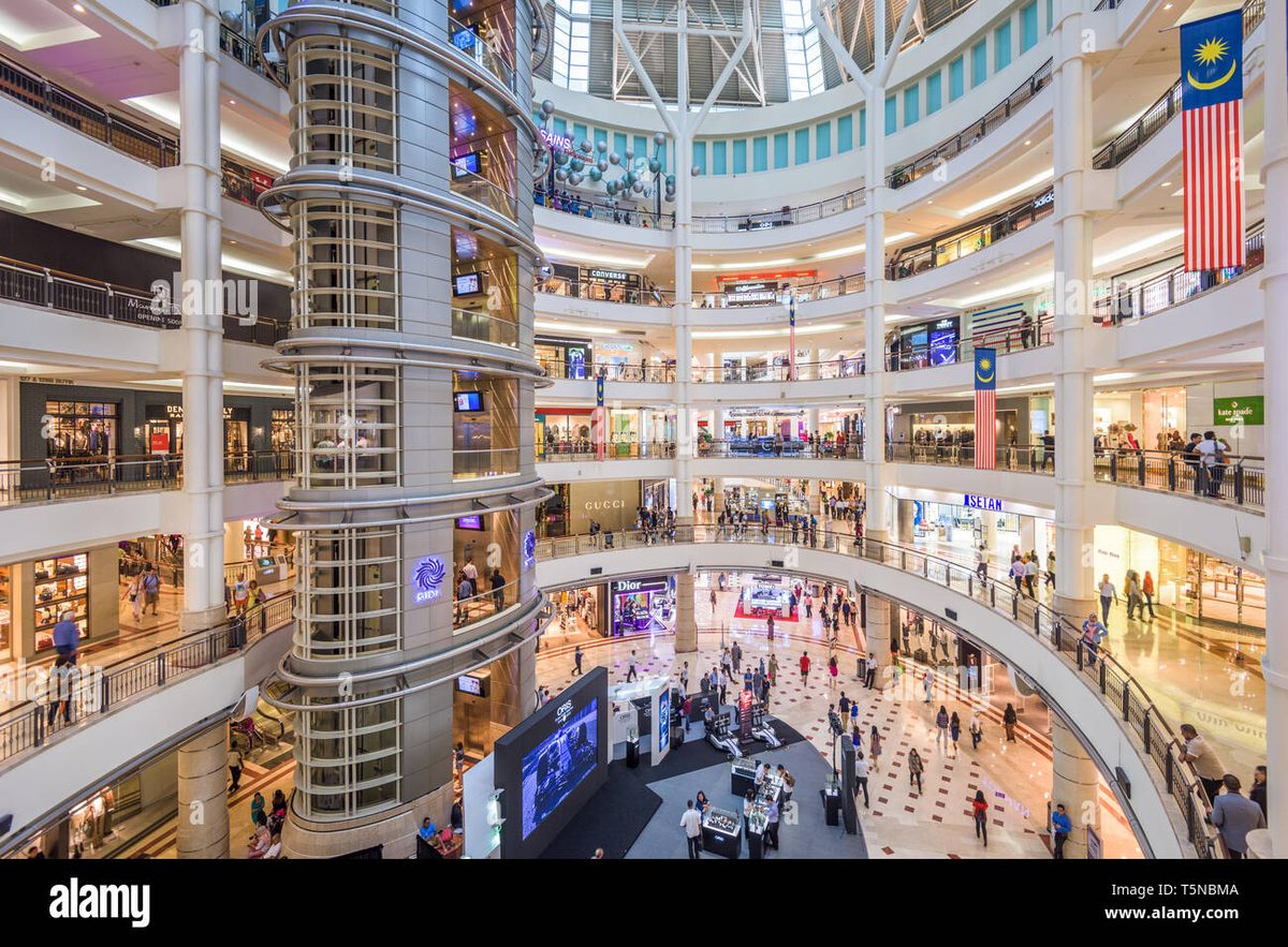 Shoppers browsing in Suria KLCC corridor